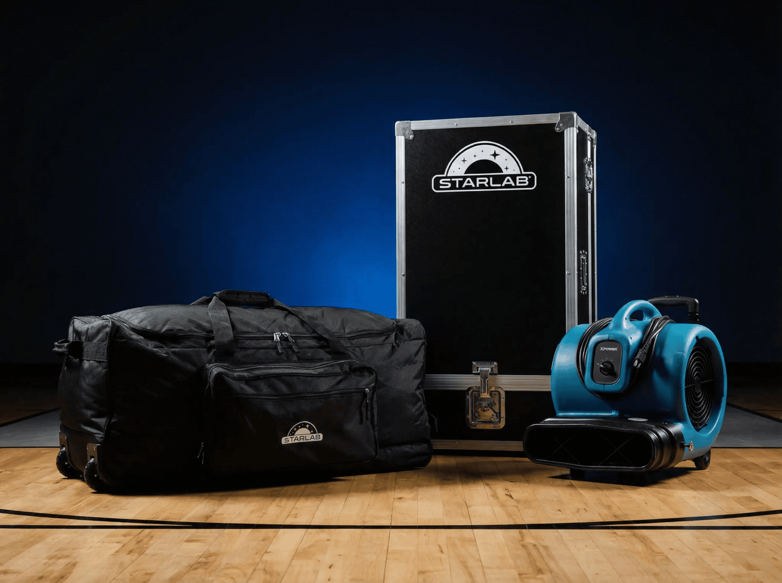 A Starlab travel bag, box, and blower fan